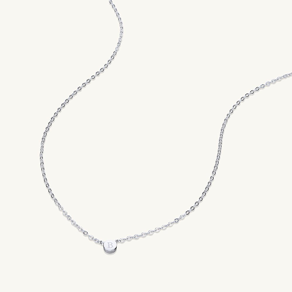 Initial dot necklace close-up detail in gold vermeil