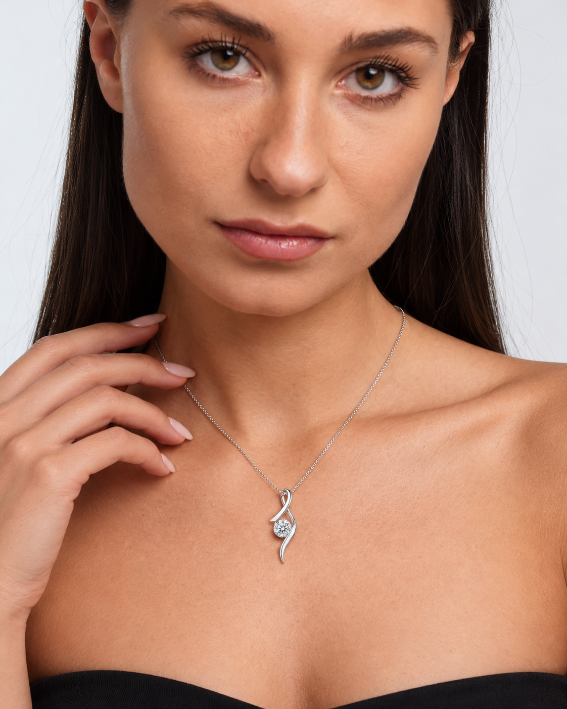 Sterling Silver Cubic Zirconia Solitaire Pendant Necklace in silver worn by a model, close-up detail