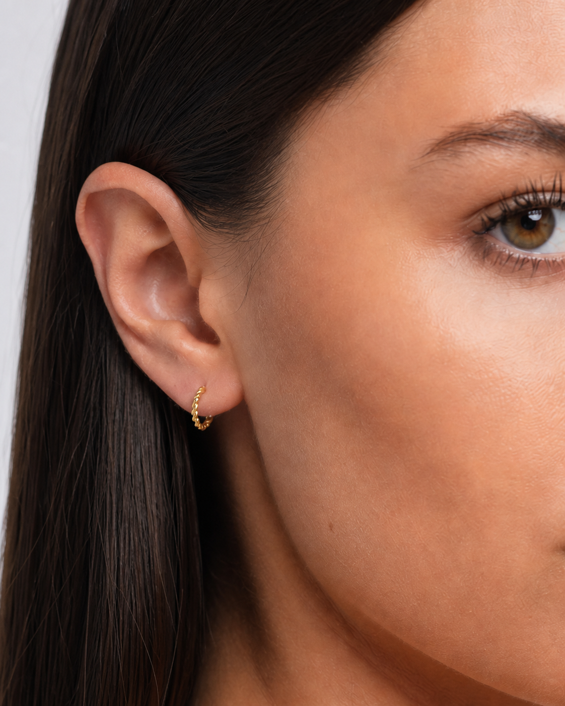 Small Gold Thin Hoop Earrings - model photo 1