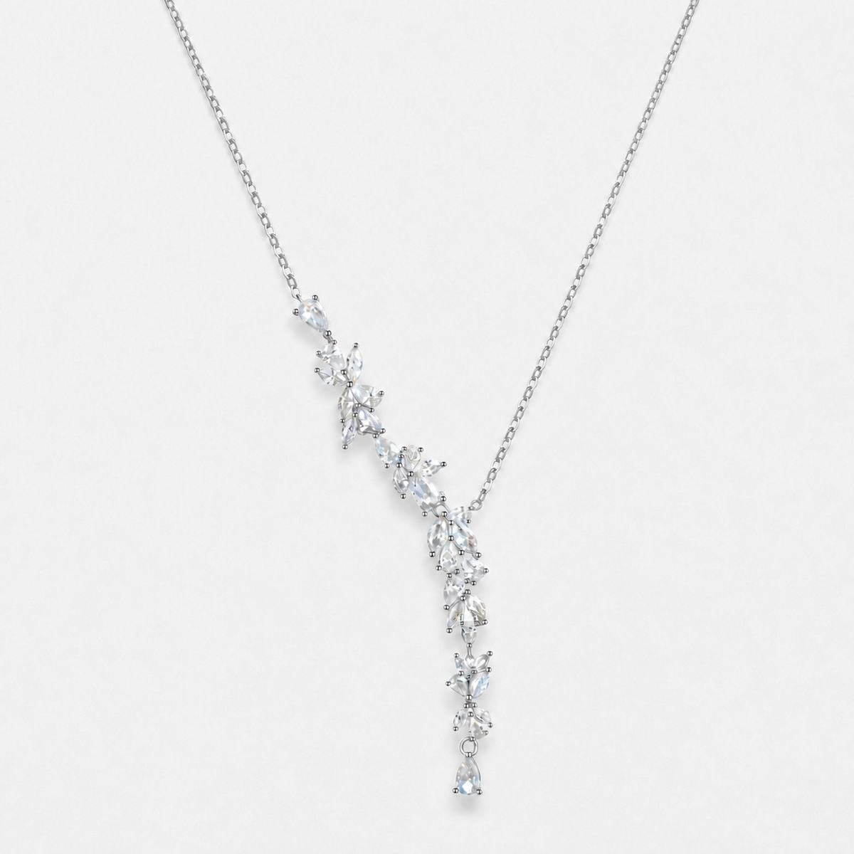 Wisteria floral Y necklace in silver colour with clear stone accents photographed alone