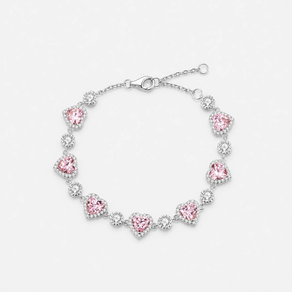 Pink Halo bracelet with pink heart centres and clear round links photographed alone