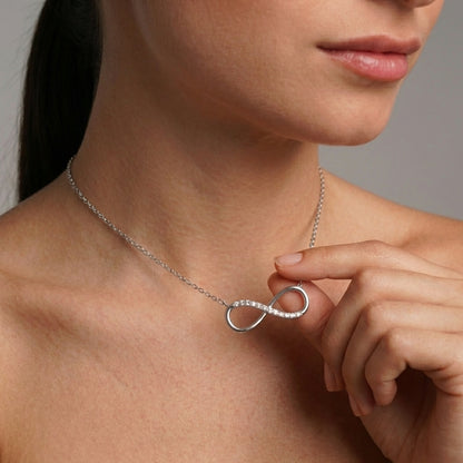 Sterling silver love necklace, side angle view