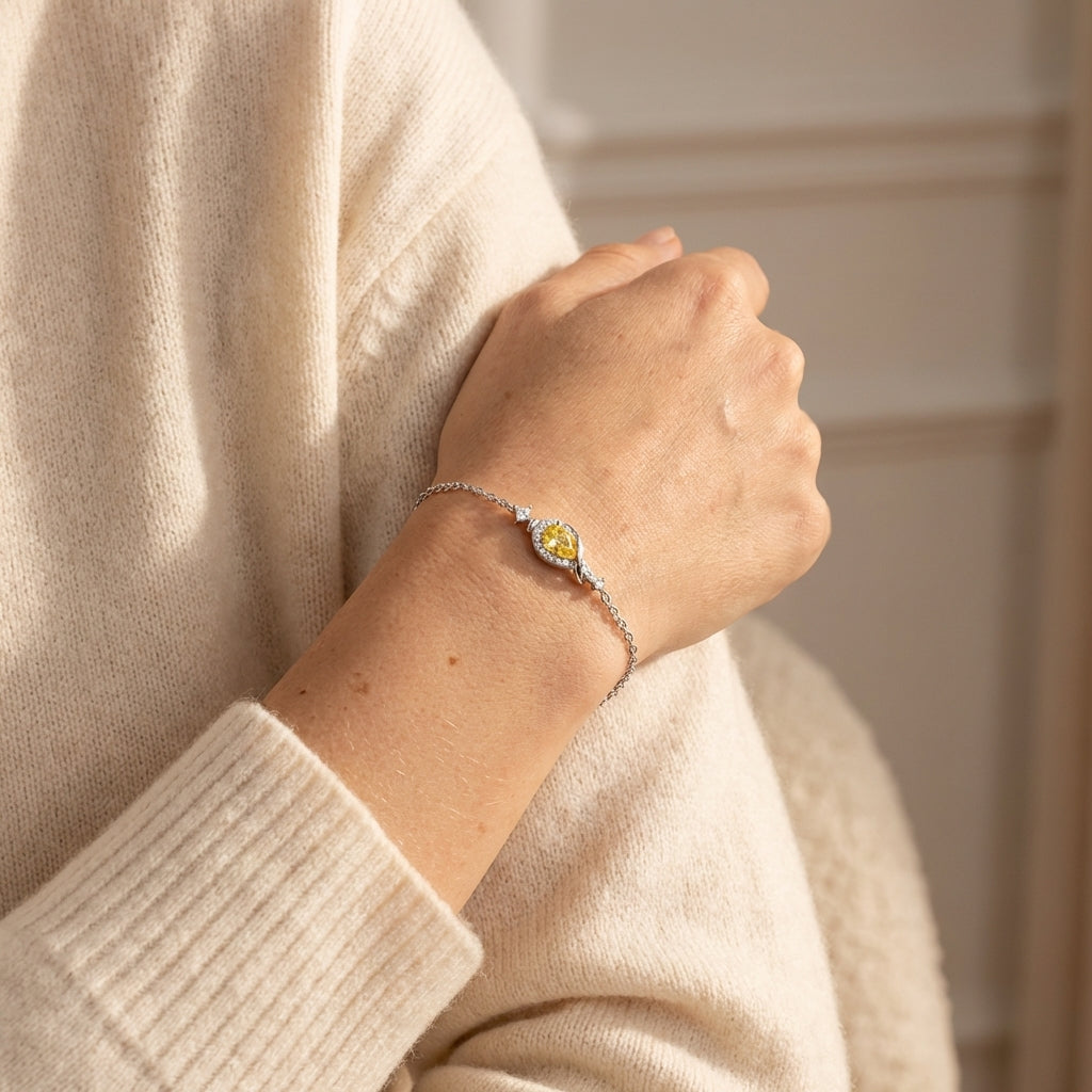 Felix felicis bracelet styled on a feminine wrist