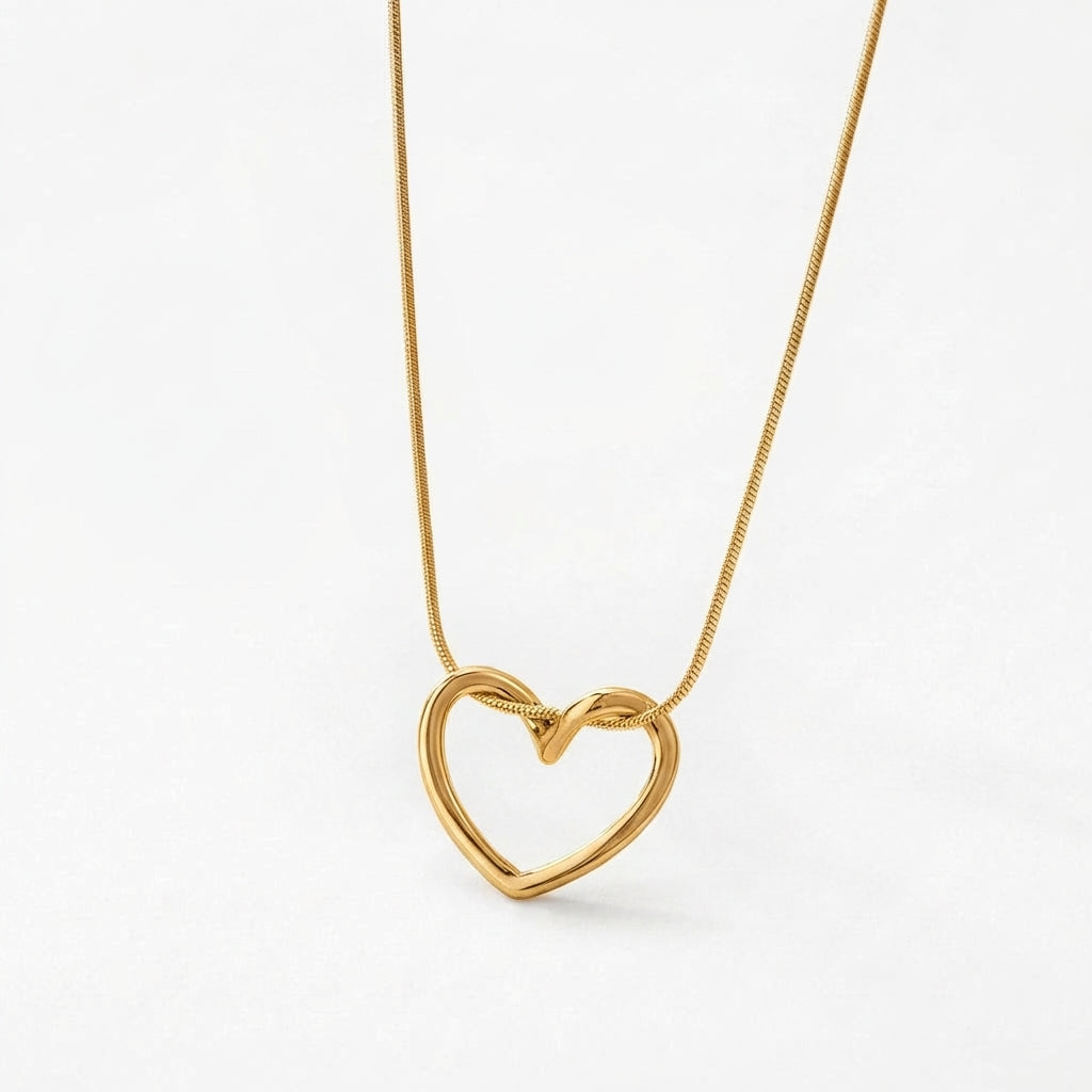 Solstice heart necklace in polished gold finish
