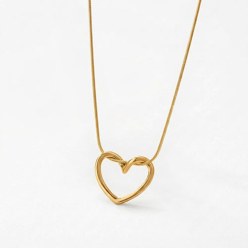 Solstice heart necklace in polished gold finish