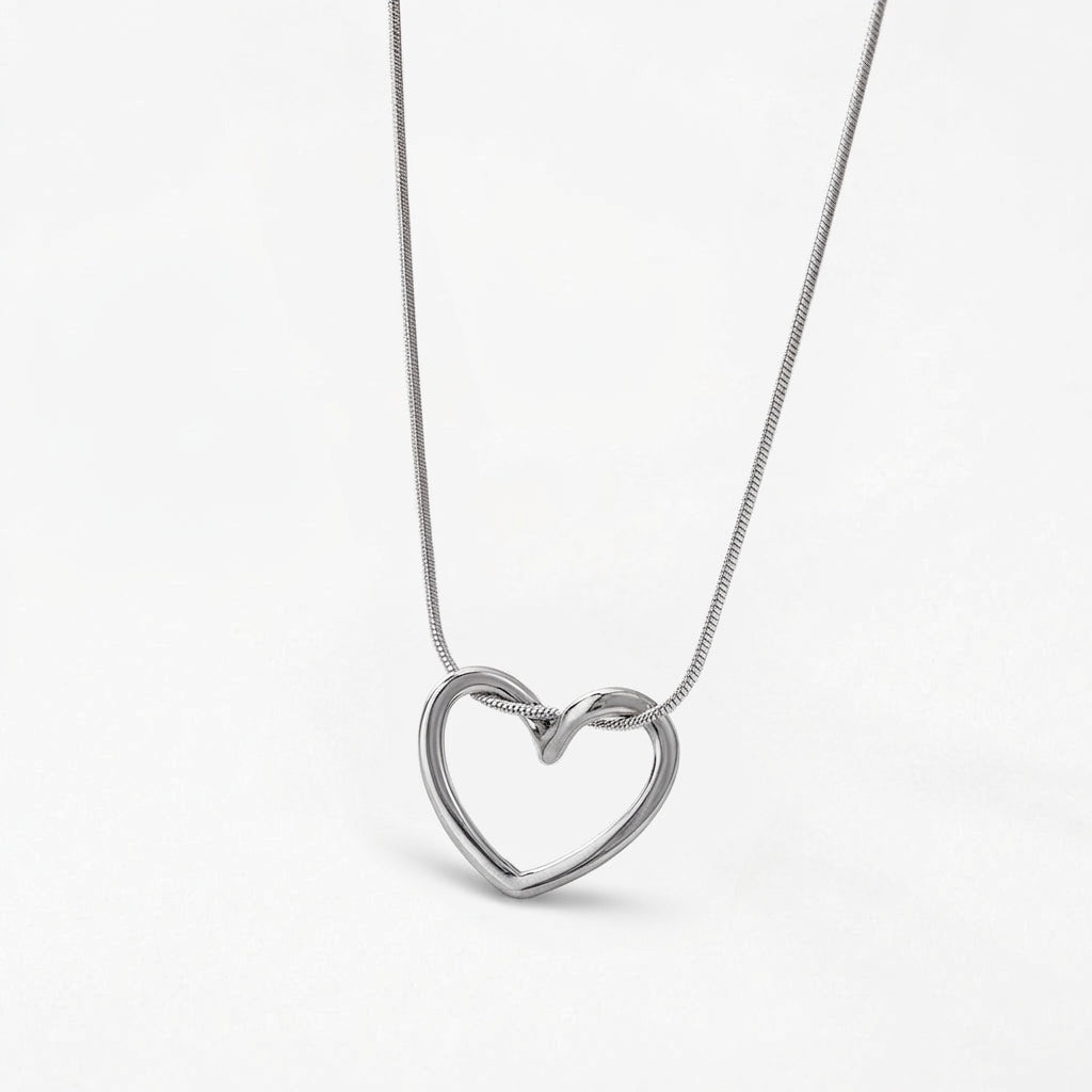 Gold heart pendant necklace detail shot