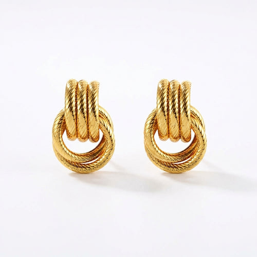 Giro Bella knot earrings in 18K gold-plated stainless steel — front view