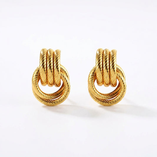 Giro Bella knot earrings in 18K gold-plated stainless steel — front view