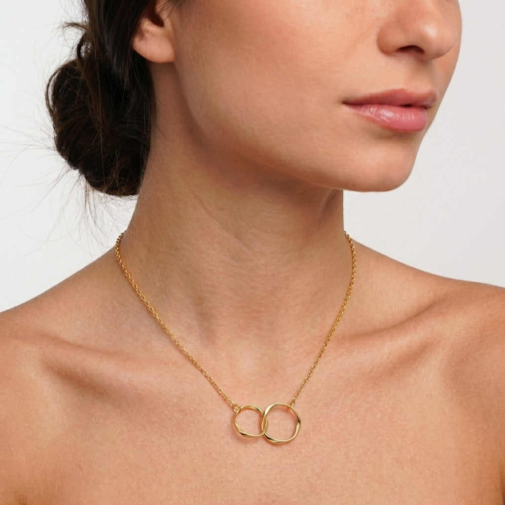 Symbolic interlocked circles necklace, refined design