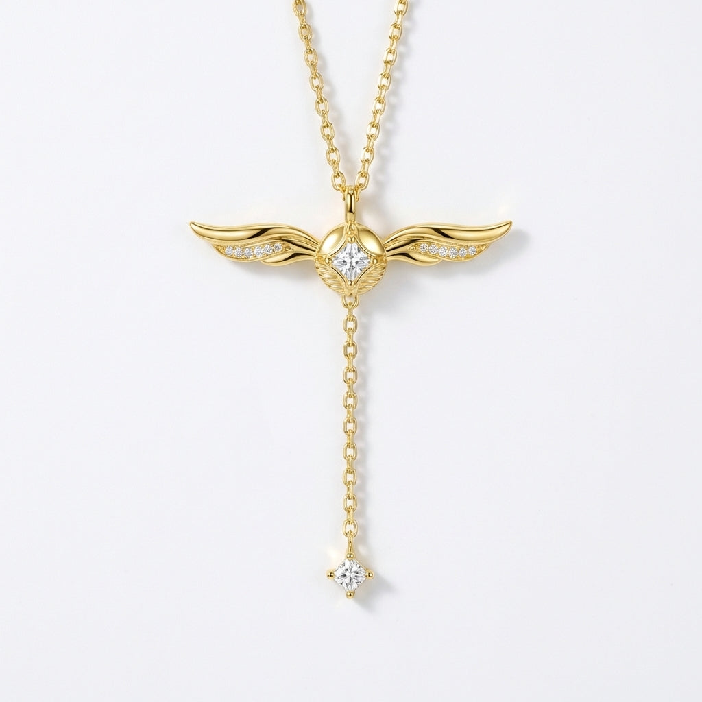 Gold-plated lariat necklace with winged cubic zirconia pendant, close-up – Ravyena