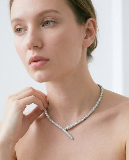 Stefanie gold snake necklace, side angle view