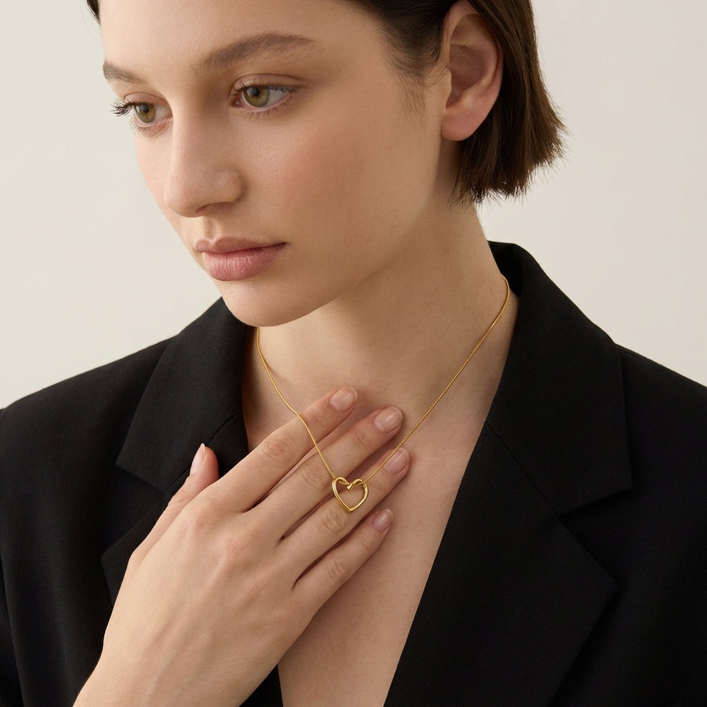 Close-up of solstice gold heart pendant detail
