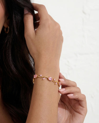Ottilie Vine floral bracelet laid flat on neutral background
