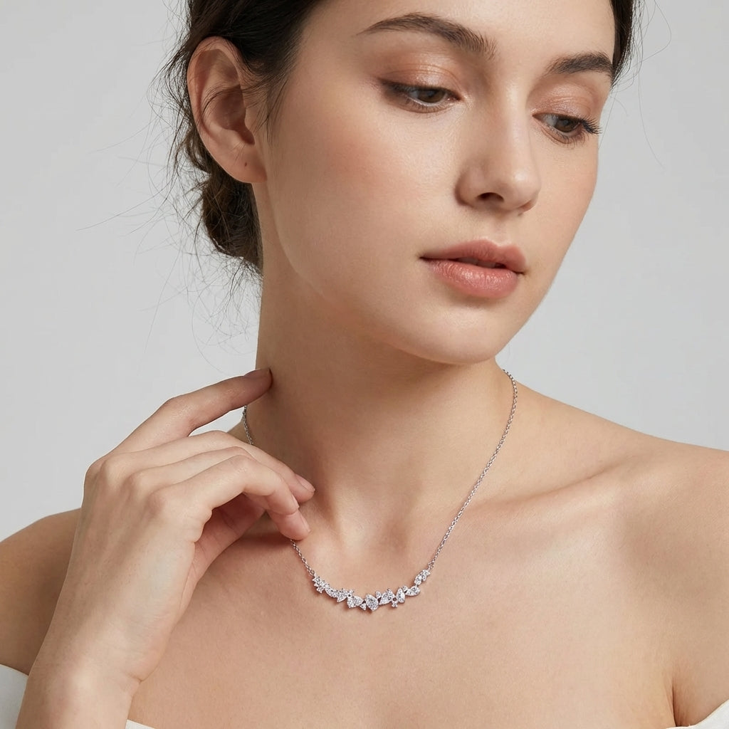 Delicate wisteria flower pendant on a model's neck