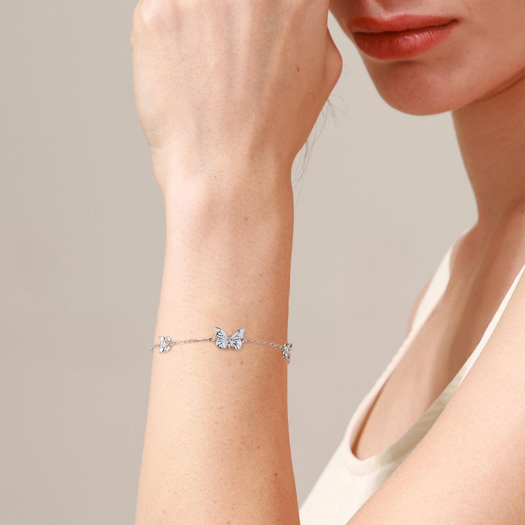 Glow-in-dark butterfly bracelet styled on a model