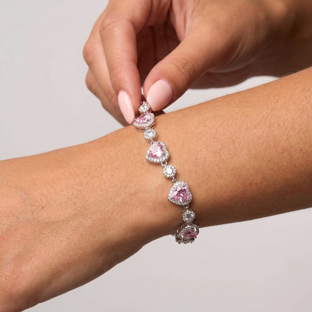 Close-up of pink halo heart bracelet detail