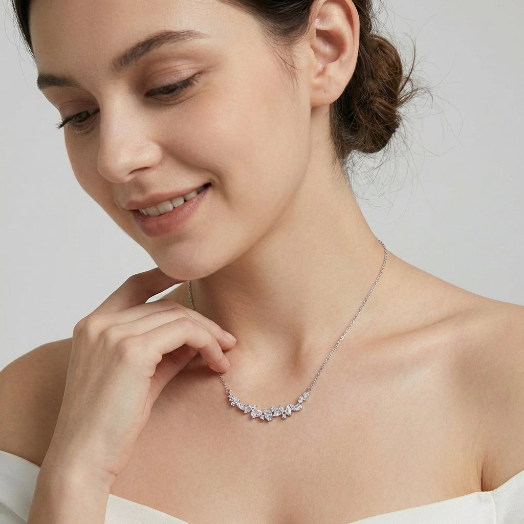 Wisteria flower necklace in gold finish on a feminine neckline