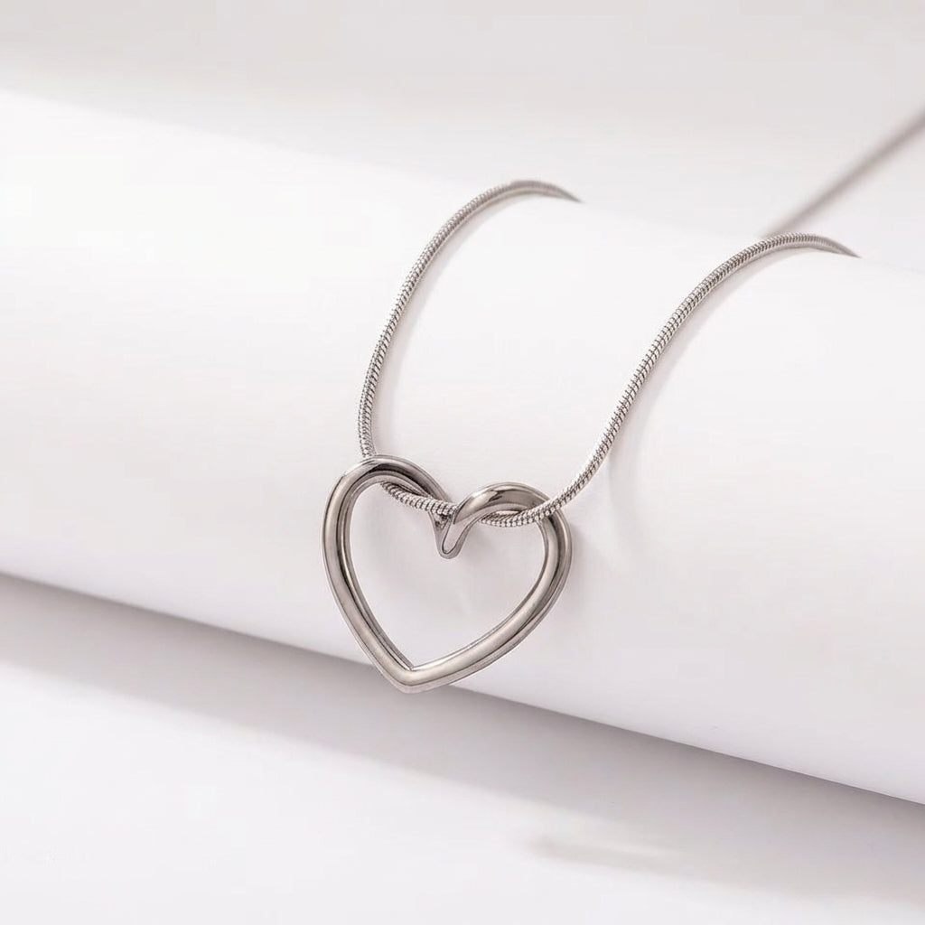Solstice heart pendant on neutral background