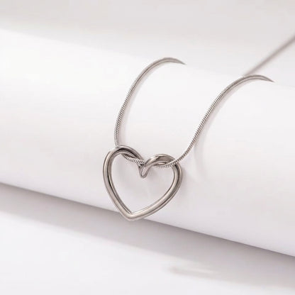 Solstice heart pendant on neutral background