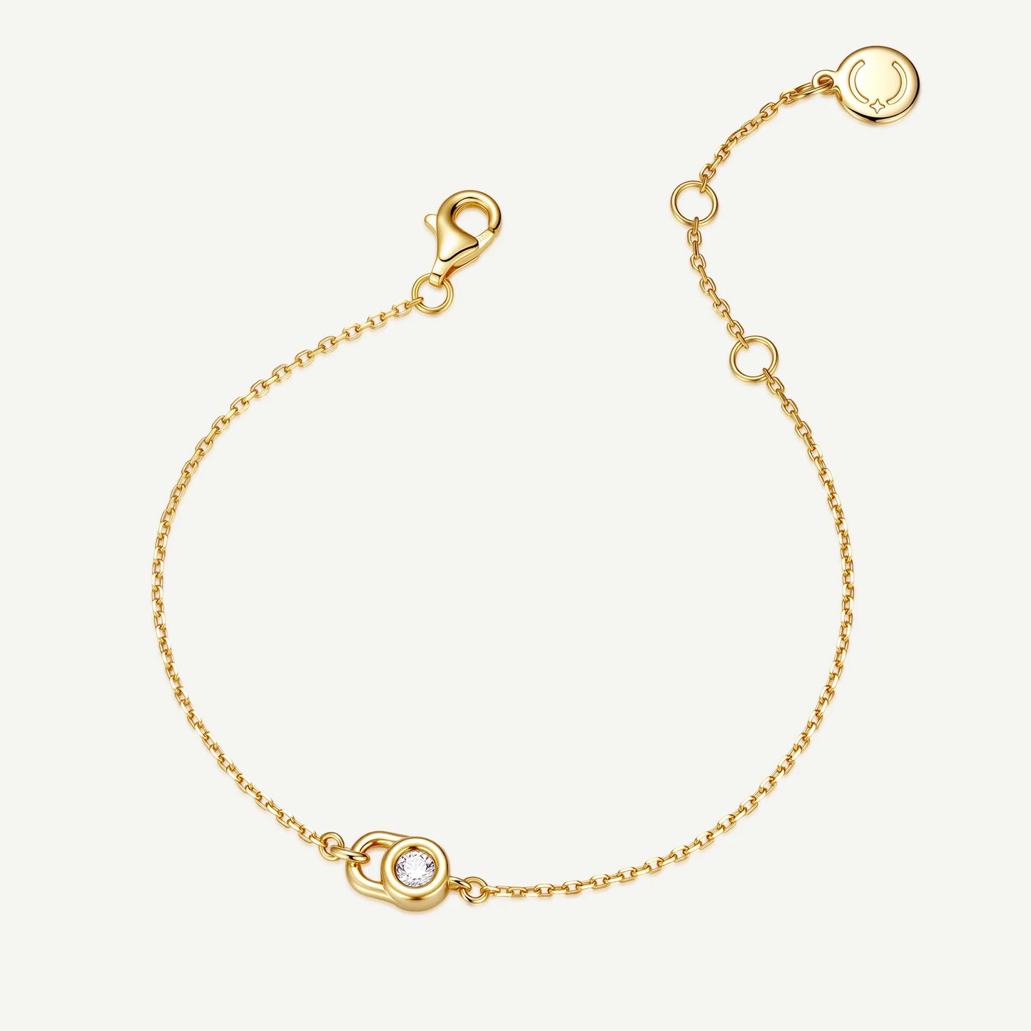 Close-up of polished 925 sterling silver lock pendant bracelet