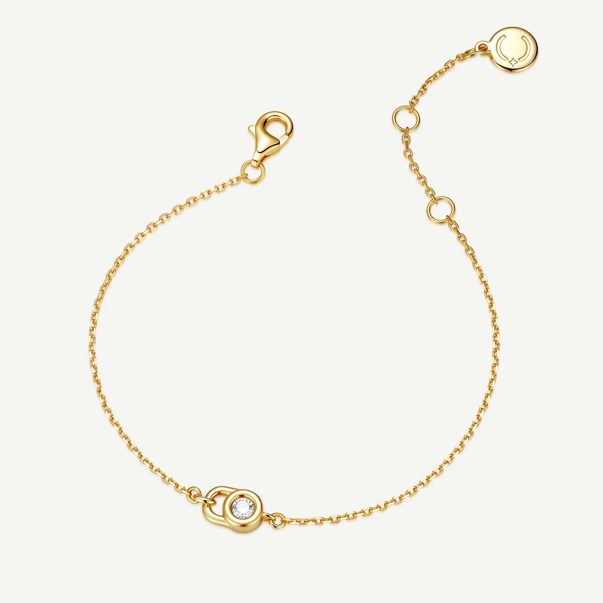 Close-up of polished 925 sterling silver lock pendant bracelet