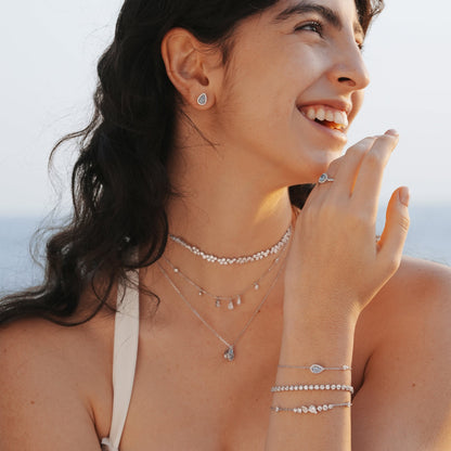 Close-up of luminous aquamarine pendant detail in sterling silver