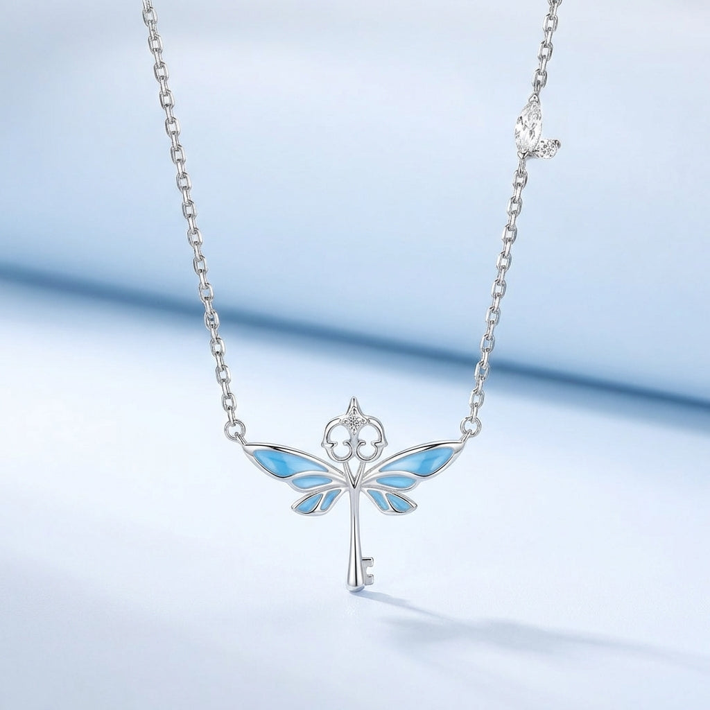 Close-up of silver flying keys pendant detail