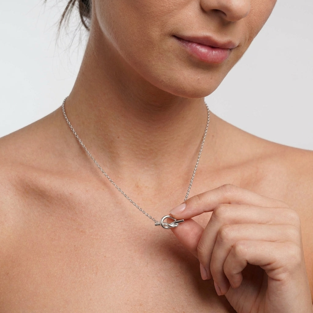 Love knot necklace, side angle view