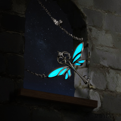 Flying keys glow necklace shown with delicate chain
