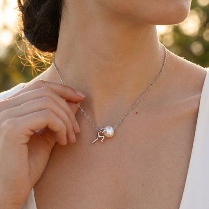 Sisyphus pearl necklace, side angle view