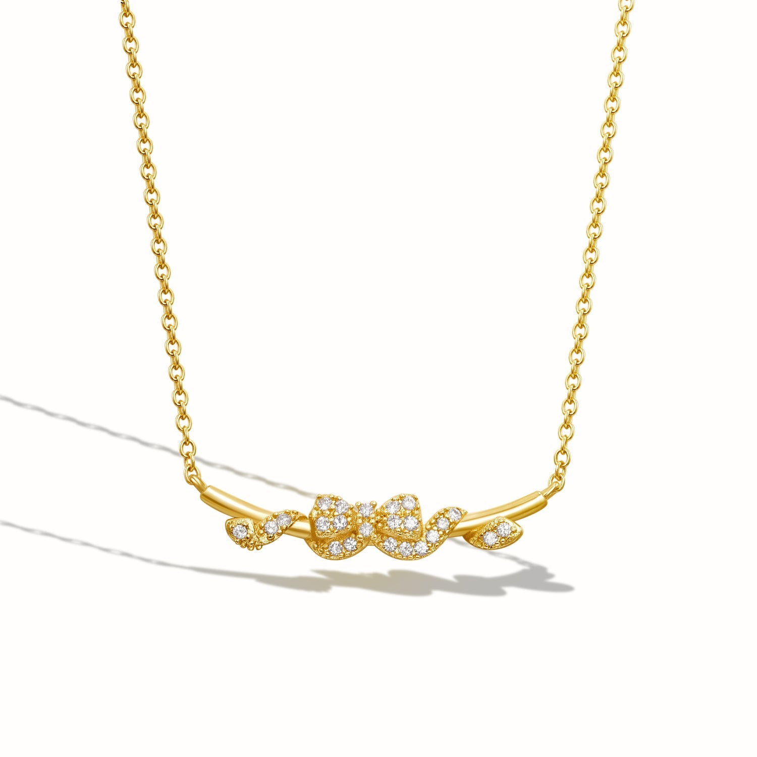 Aurora bow necklace in polished gold finish