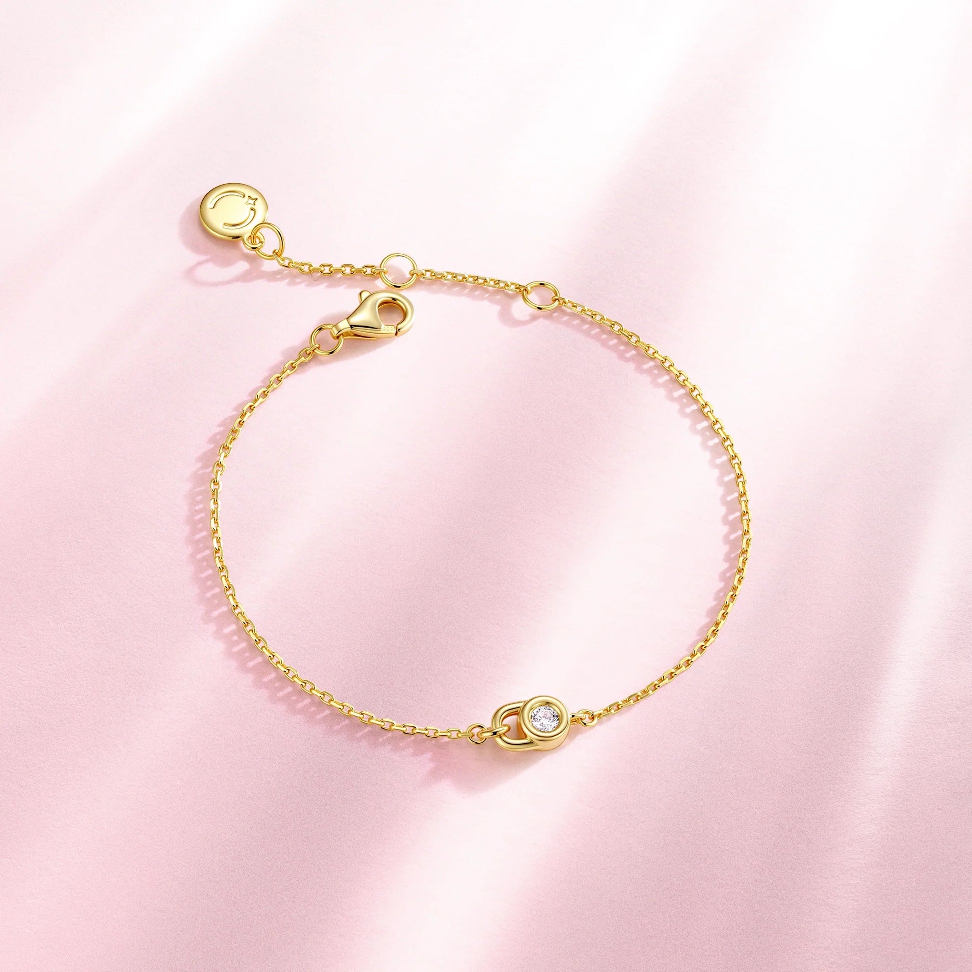 Sterling silver chain bracelet with lock charm, fine jewellery detail