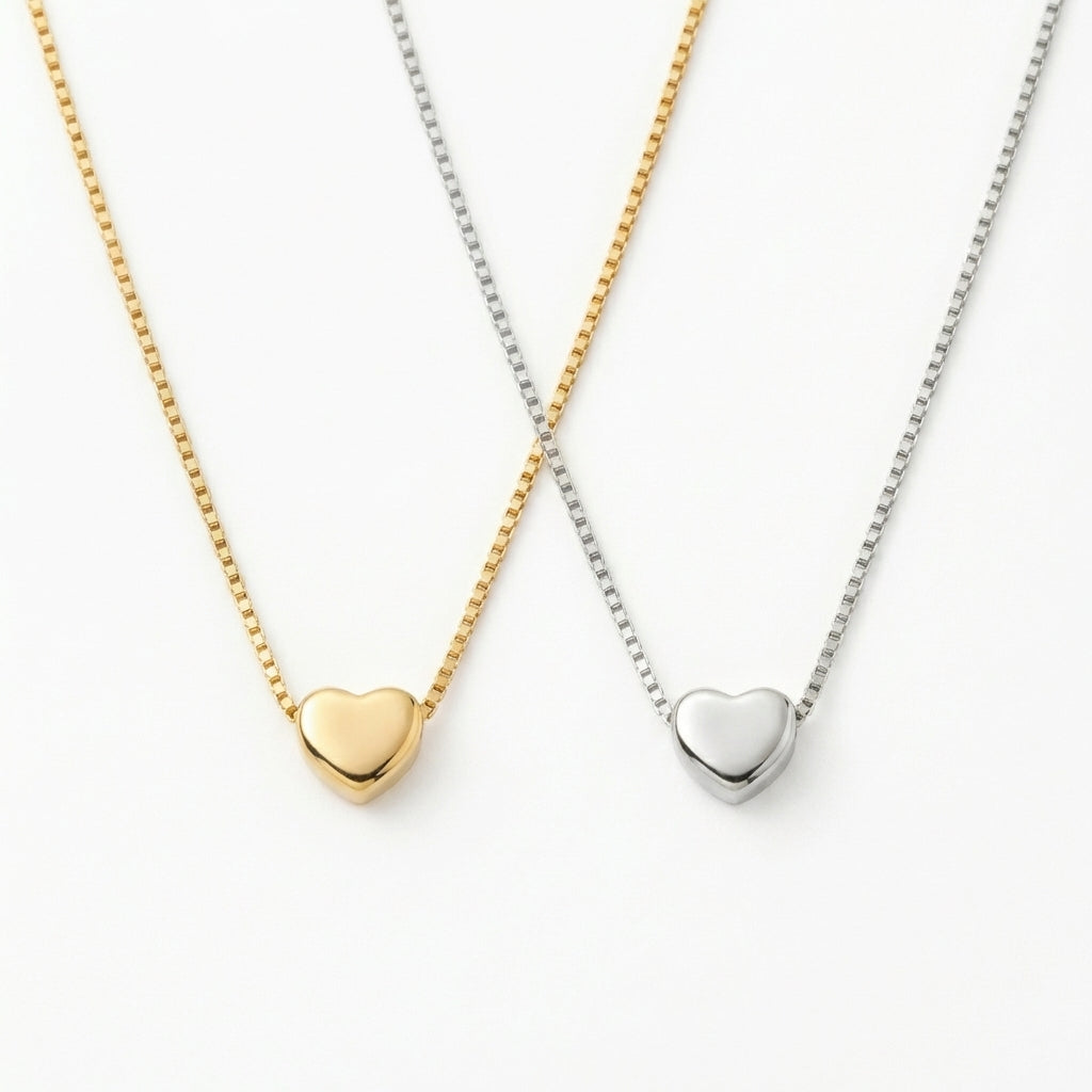 My petite heart necklace on neutral background