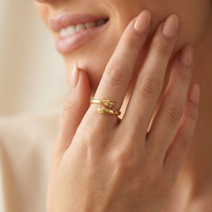 Sculptural gold hug ring, side angle view