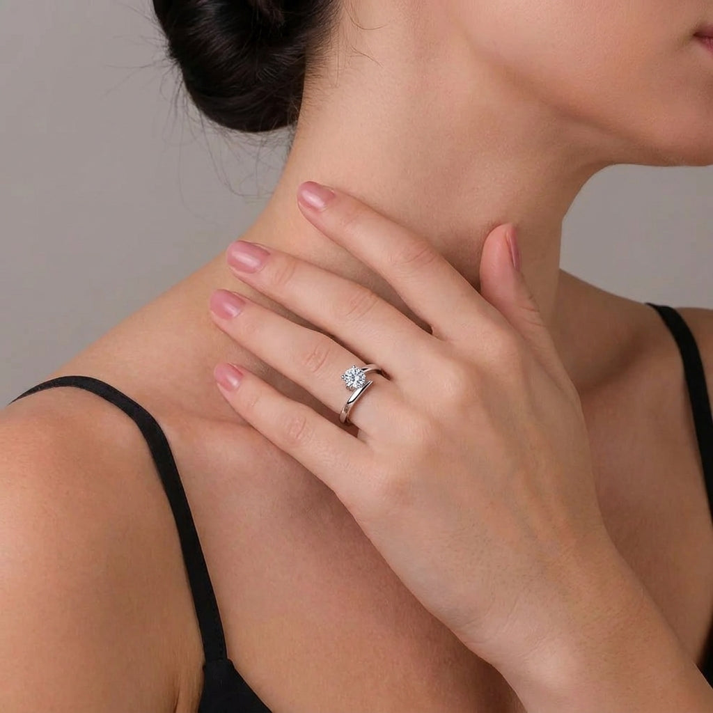 Adjustable silver ring styled on a feminine hand