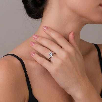 Adjustable silver ring styled on a feminine hand