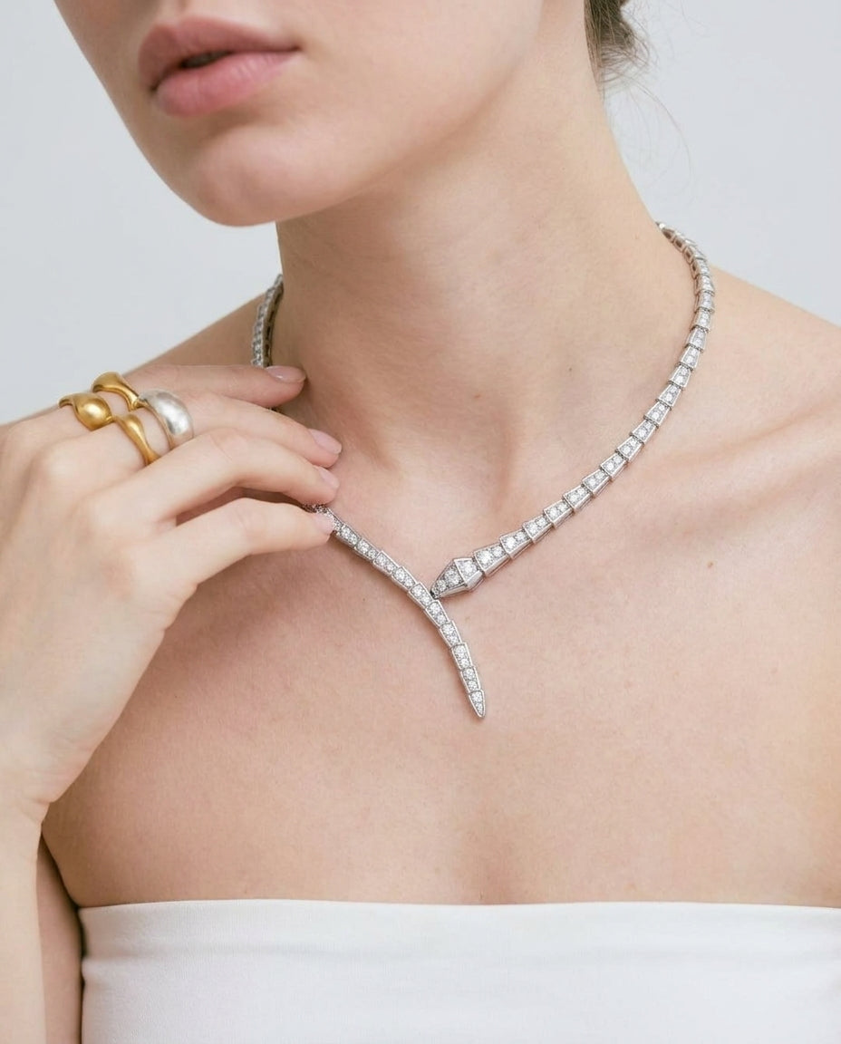 Gold snake choker styled with elegant evening look