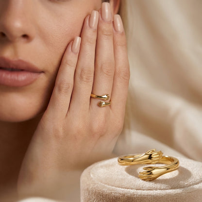 Gold hug-inspired ring, sculptural feminine design