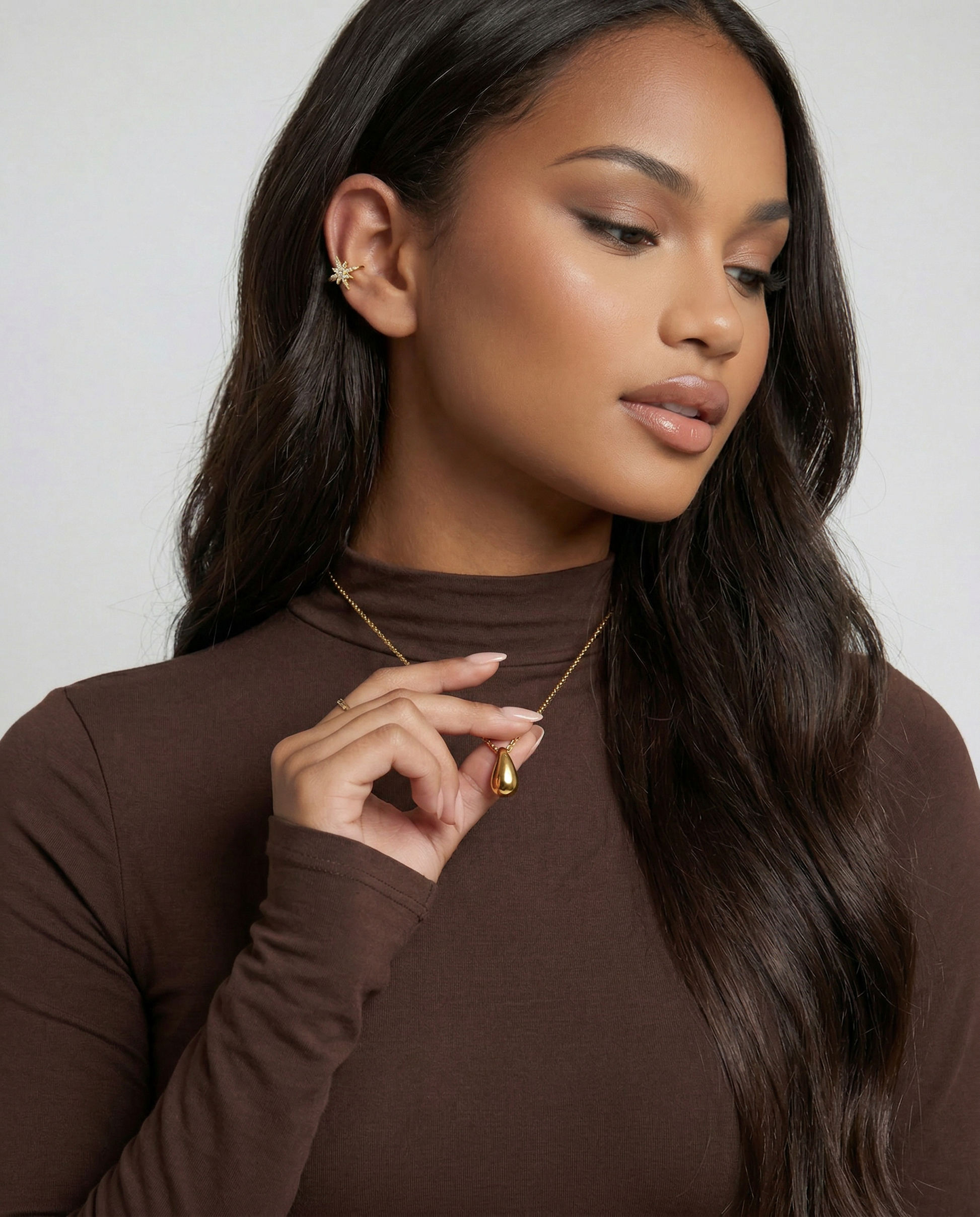 Solitaire star ear cuff styled on a model