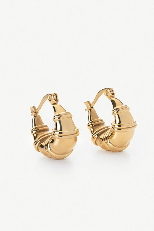 Chunky teardrop ringed gold drop earrings by Ravyena