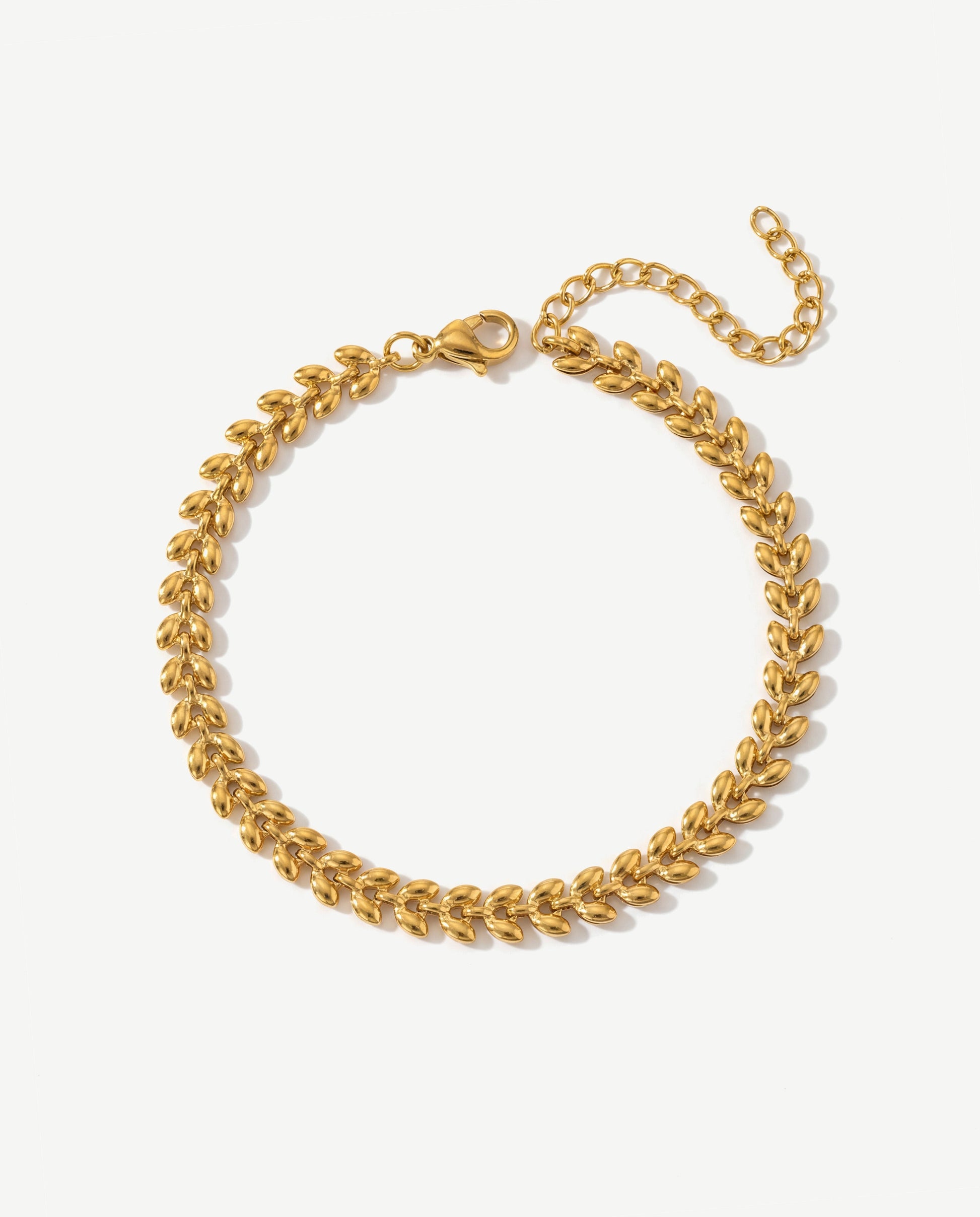 14K gold leaf chain bracelet with cascading polished leaves