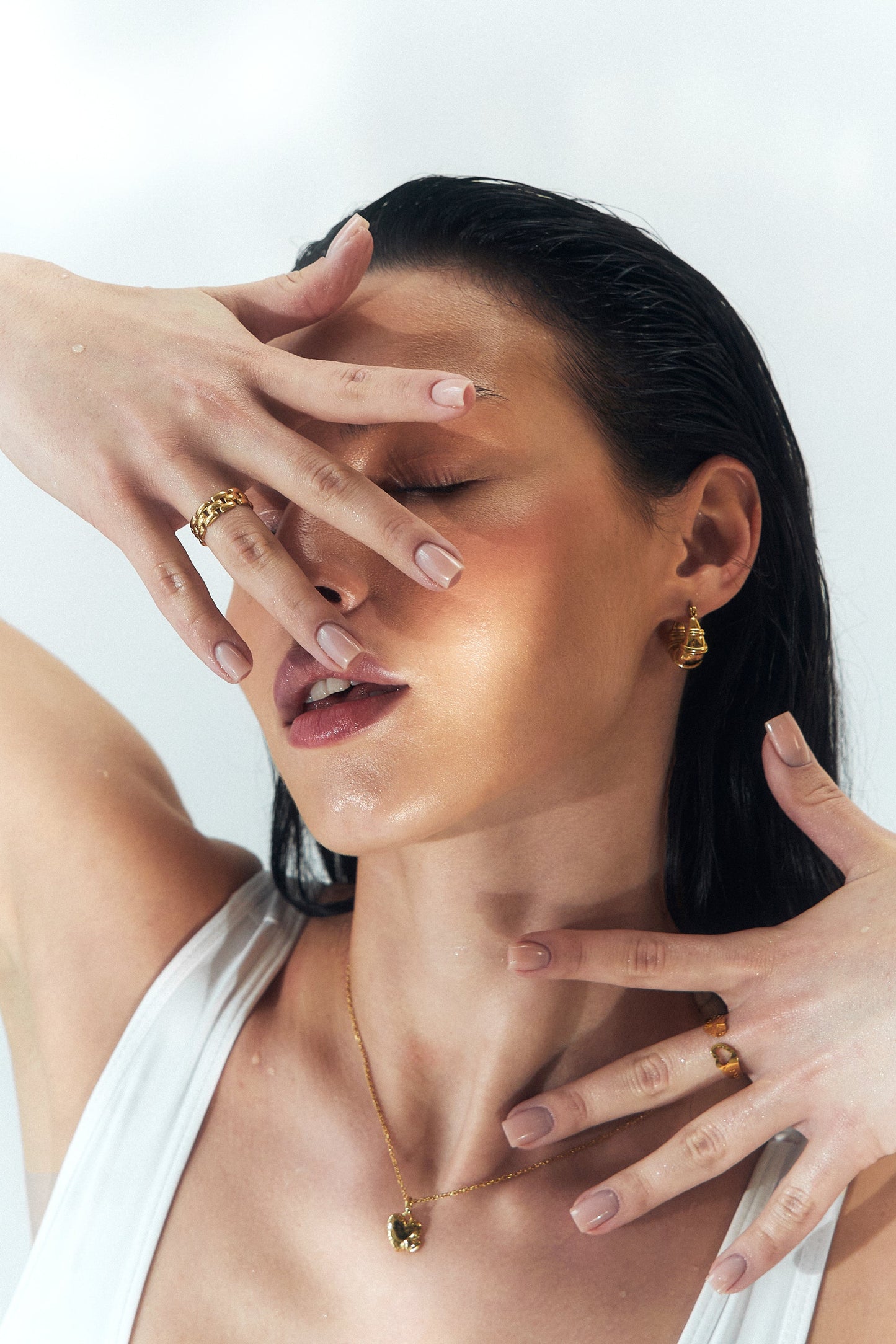 Ravyena chunky teardrop earrings styled on model