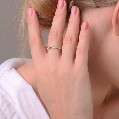 Eternal love ring styled on a feminine hand