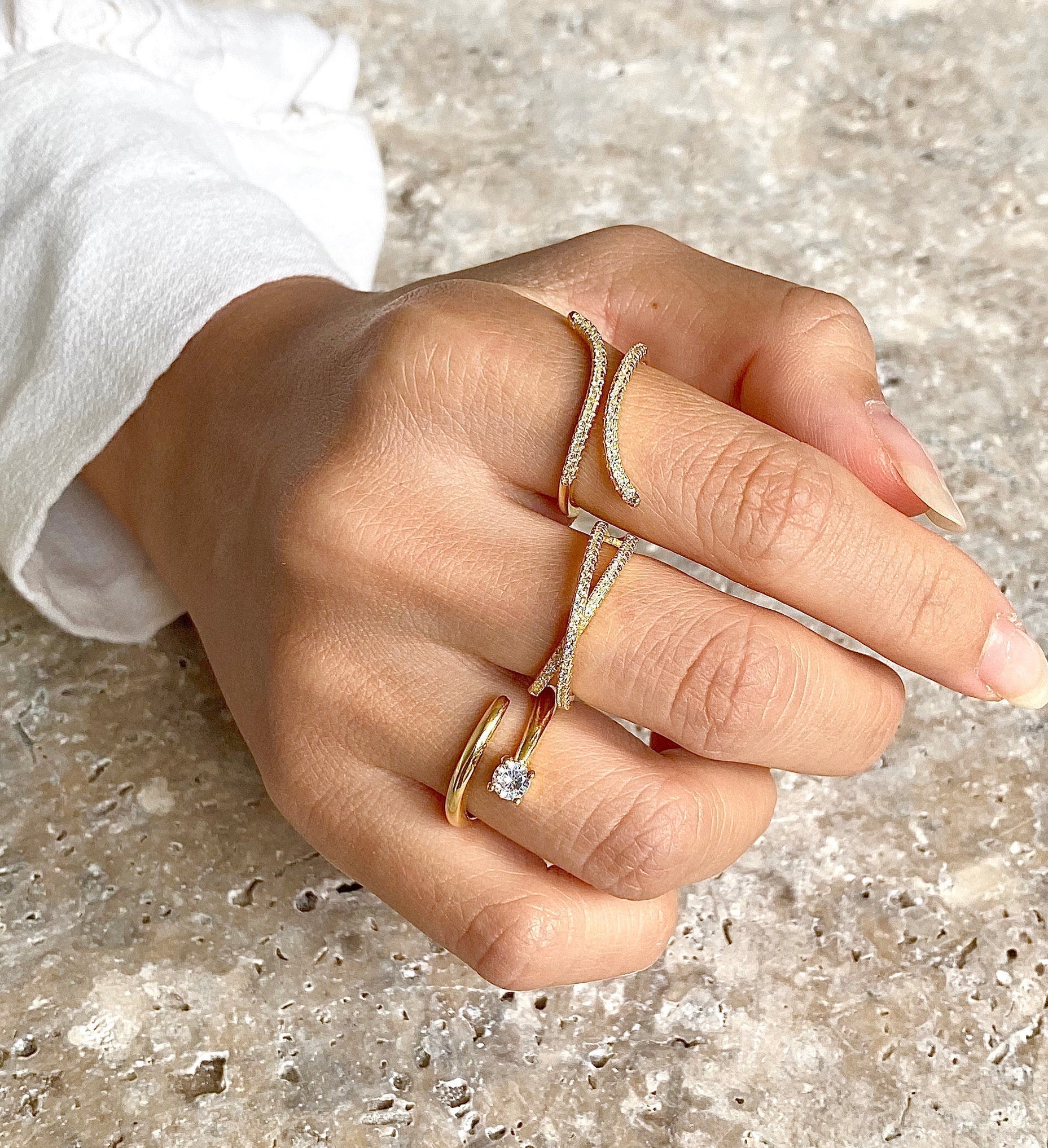 Ravyena Flare Ring worn on hand — dramatic flared crystal statement ring