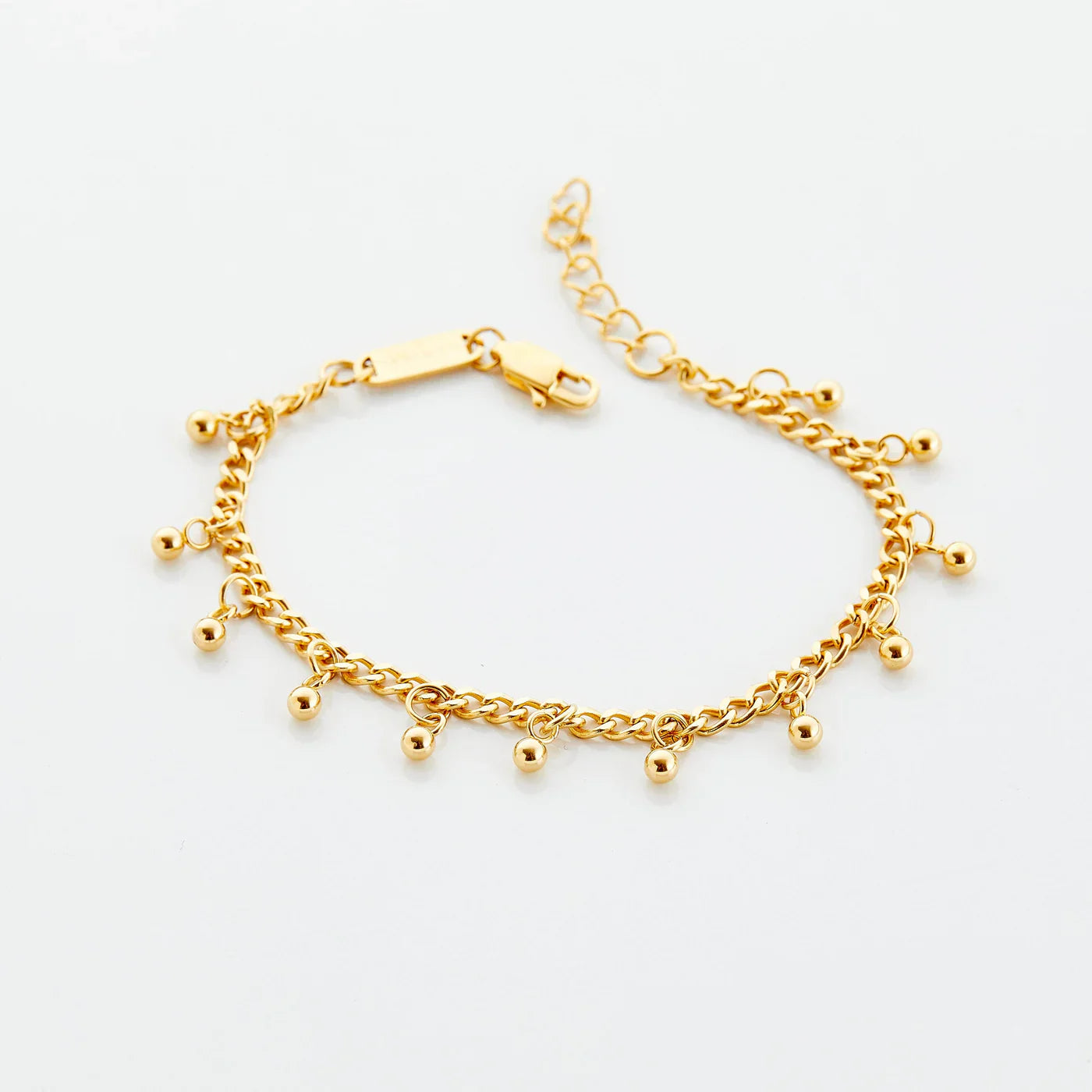 Gold Dangling Charm Bracelet — Indian-Inspired Dotted Design