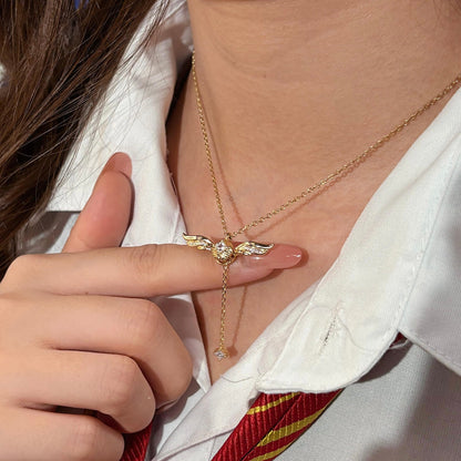 Gold-plated winged lariat necklace, alternative angle