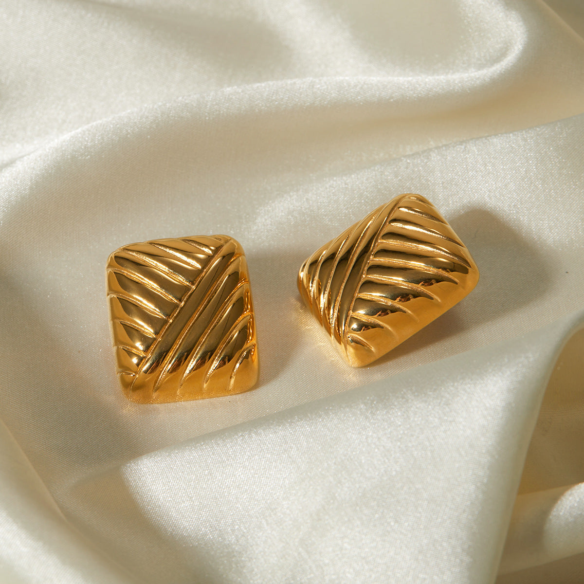 Statement gold textured earrings for women