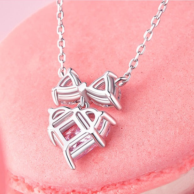 Sterling silver bow pendant on delicate chain