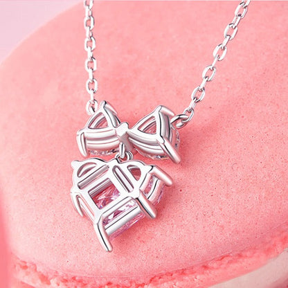 Sterling silver bow pendant on delicate chain