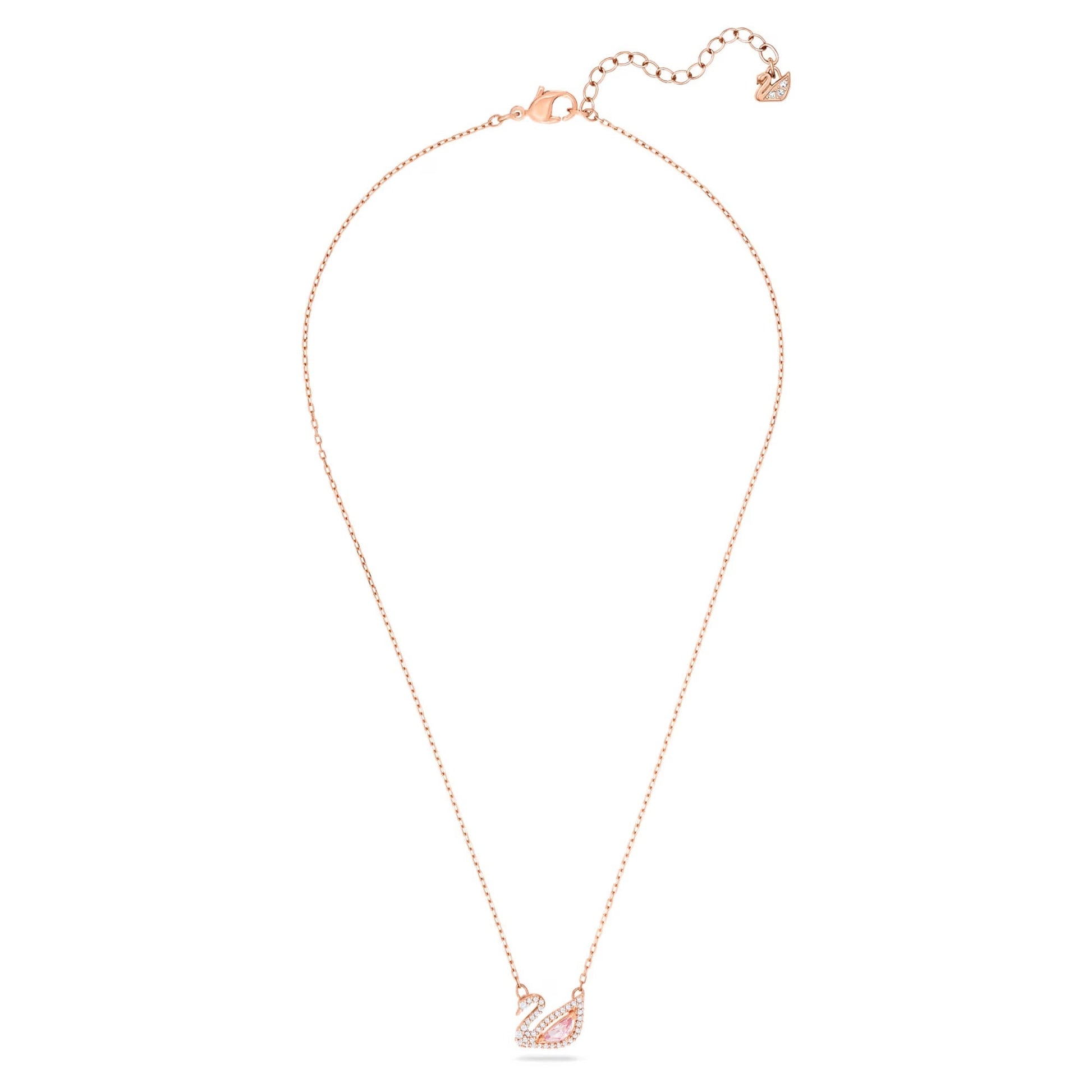 Close-up of pink crystal swan pendant in rose gold